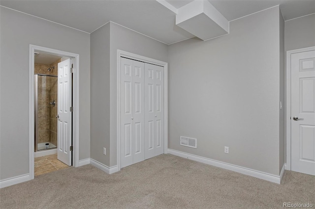 2500 Lexington St, Lafayette, CO 80026 - unfurnished bedroom featuring light colored carpet, a closet, baseboards, and ensuite bathroom