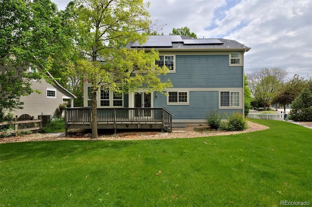 2500 Lexington St, Lafayette, CO 80026 - rear view of property with a deck, solar panels, and central AC unit