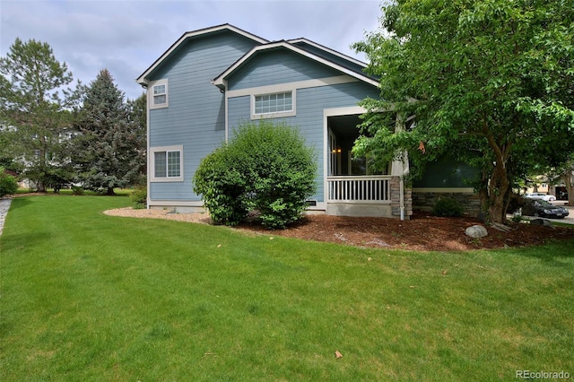 2500 Lexington St, Lafayette, CO 80026 - view of side of home featuring a lawn