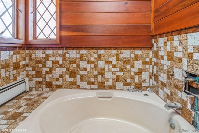 bathroom featuring a washtub