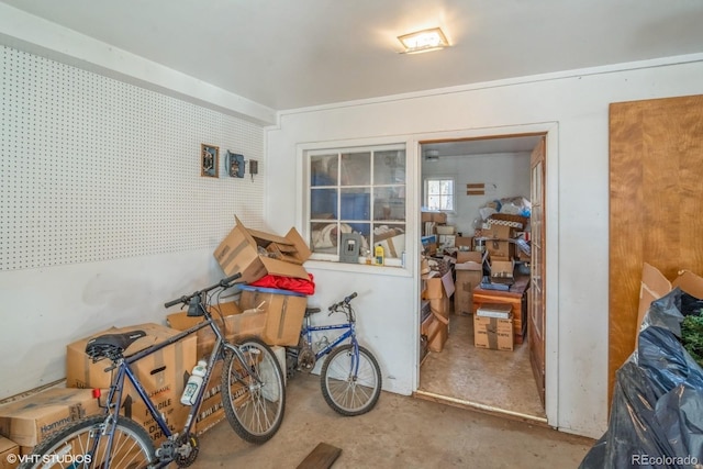 misc room with concrete flooring