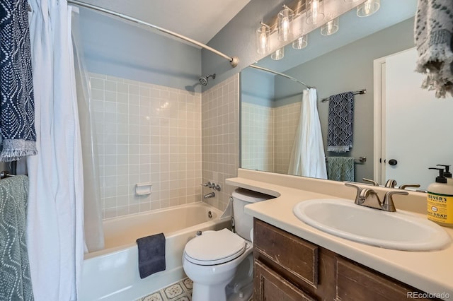 bathroom featuring shower / bath combo, vanity, and toilet