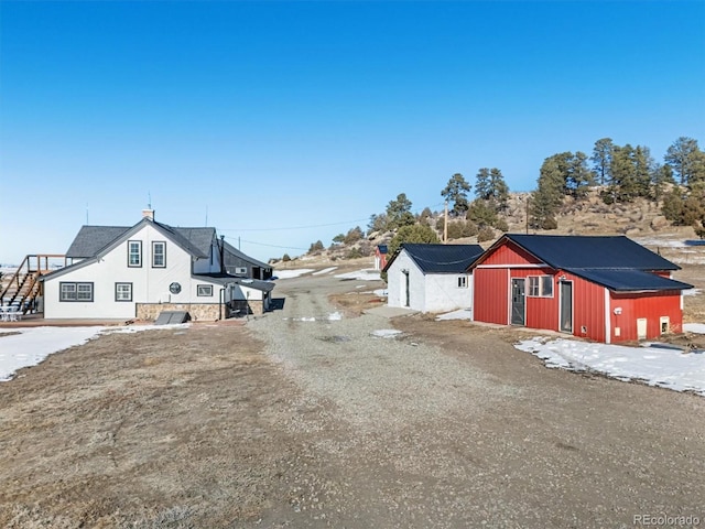 exterior space featuring an outbuilding