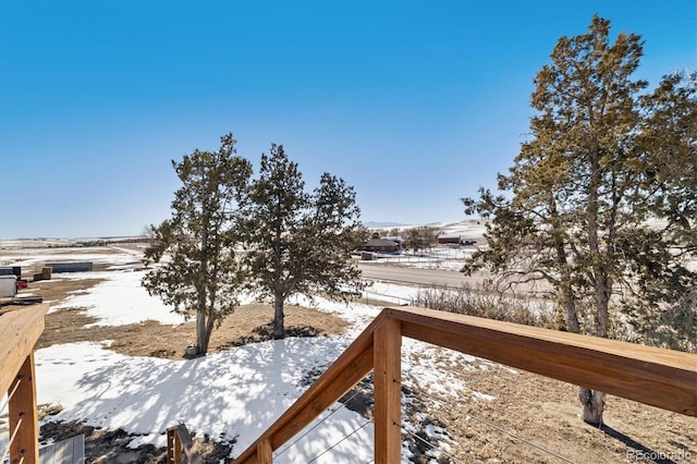 view of snow covered deck