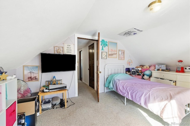 carpeted bedroom featuring vaulted ceiling