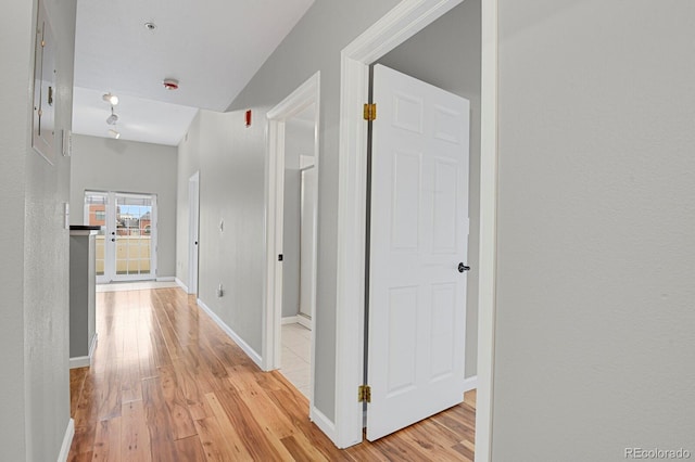 1780 N Washington St Unit 405, Denver, CO 80203 - hallway featuring light wood-style floors and baseboards