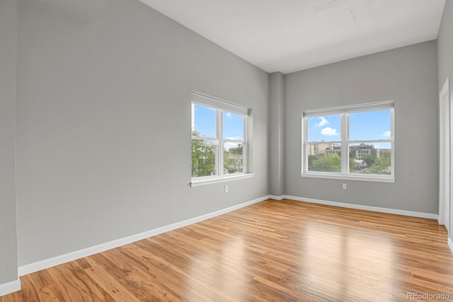 1780 N Washington St Unit 405, Denver, CO 80203 - spare room with light wood-style flooring and baseboards