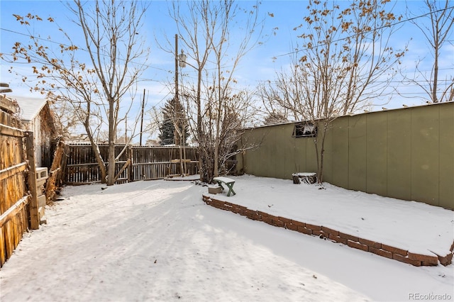 view of snowy yard