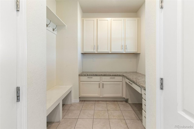 mudroom featuring light tile patterned floors