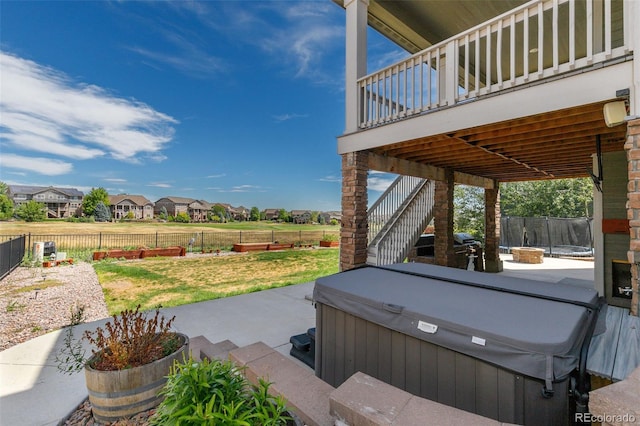 view of patio featuring a hot tub