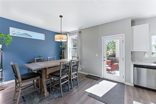 10116 Wyandott Cir, Denver, CO 80260 - dining room featuring plenty of natural light and wood finished floors