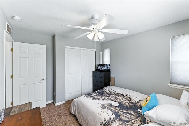 10116 Wyandott Cir, Denver, CO 80260 - bedroom with carpet floors, a closet, and a ceiling fan