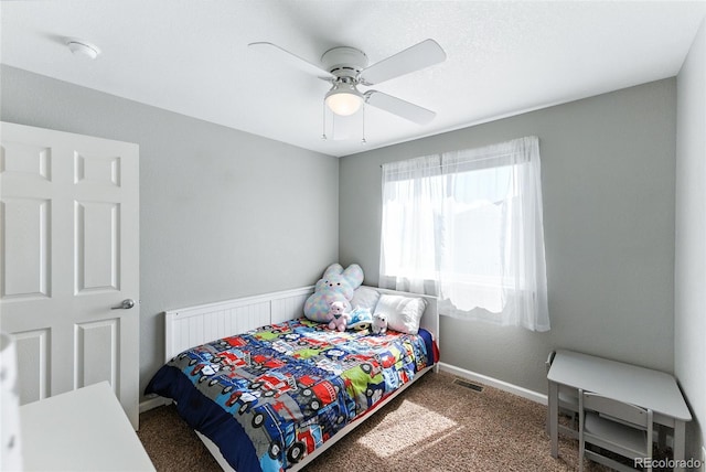 10116 Wyandott Cir, Denver, CO 80260 - carpeted bedroom with baseboards and ceiling fan