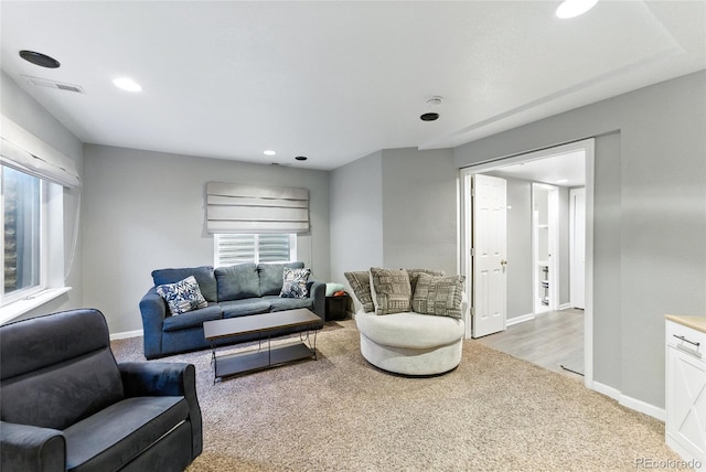 10116 Wyandott Cir, Denver, CO 80260 - living area with light carpet and recessed lighting
