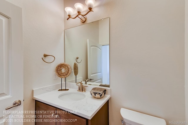935 W 128th Pl, Westminster, CO 80234 - bathroom featuring vanity and toilet