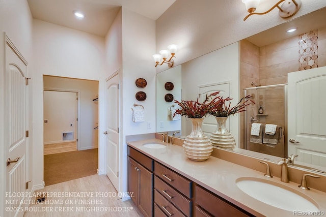 935 W 128th Pl, Westminster, CO 80234 - full bath featuring double vanity, a stall shower, and recessed lighting