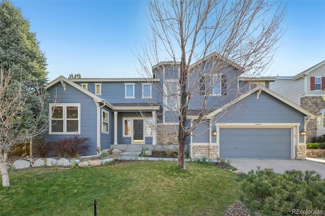 2660 Timberchase Trl, Highlands Ranch, CO 80126 - view of front of home with a garage, concrete driveway, a front lawn, and stone siding