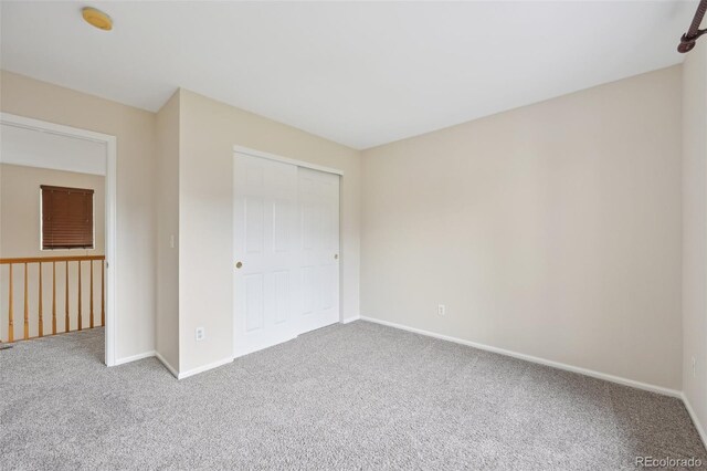 2660 Timberchase Trl, Highlands Ranch, CO 80126 - unfurnished bedroom featuring carpet, baseboards, and a closet