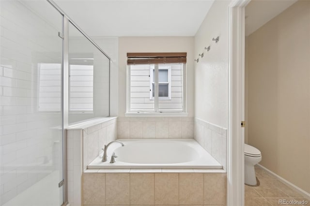 2660 Timberchase Trl, Highlands Ranch, CO 80126 - full bathroom featuring toilet, a shower stall, a garden tub, and tile patterned floors