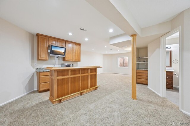 2660 Timberchase Trl, Highlands Ranch, CO 80126 - kitchen with light carpet, a kitchen island, recessed lighting, and baseboards
