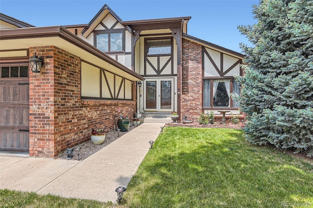 7863 W Friend Dr, Littleton, CO 80128 - view of front of house with a front lawn and brick siding