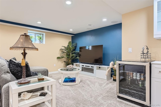 7863 W Friend Dr, Littleton, CO 80128 - carpeted living room with beverage cooler, recessed lighting, baseboards, and bar area