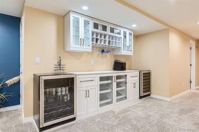 7863 W Friend Dr, Littleton, CO 80128 - indoor dry bar with wine cooler, light carpet, baseboards, and recessed lighting