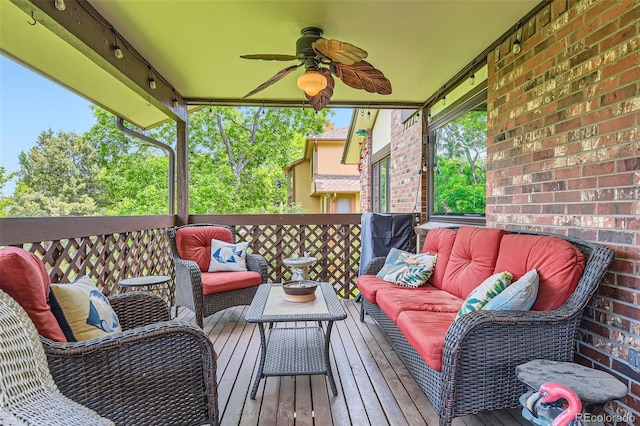 7863 W Friend Dr, Littleton, CO 80128 - wooden terrace with an outdoor hangout area and ceiling fan