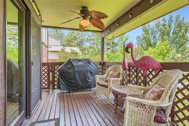 7863 W Friend Dr, Littleton, CO 80128 - wooden deck featuring ceiling fan and grilling area