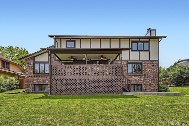 7863 W Friend Dr, Littleton, CO 80128 - rear view of house with ceiling fan, brick siding, a lawn, and stairway