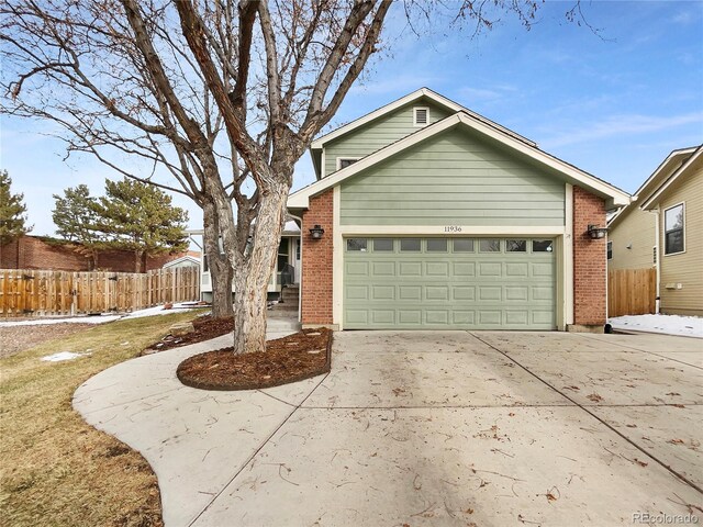 view of front of property with a garage