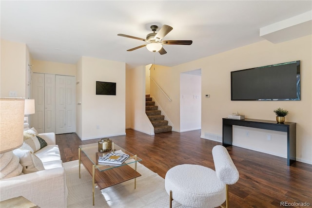12708 W Virginia Ave, Lakewood, CO 80228 - living room with stairway, a ceiling fan, wood finished floors, and baseboards