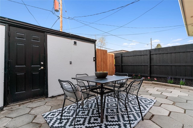12708 W Virginia Ave, Lakewood, CO 80228 - view of patio / terrace with fence and outdoor dining space