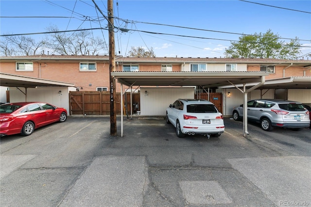 12708 W Virginia Ave, Lakewood, CO 80228 - multi unit property featuring fence and covered parking