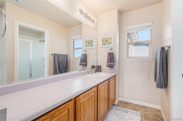 bathroom with vanity and tile patterned floors