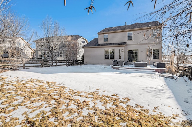 view of snow covered house