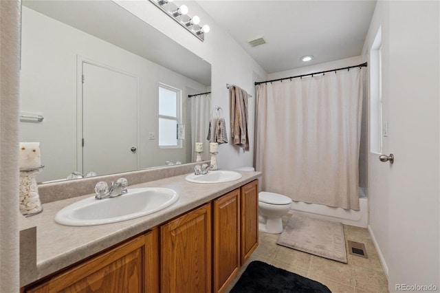 6260 E 114th Ave, Thornton, CO 80233 - full bathroom featuring double vanity, tile patterned floors, and shower / bath combination with curtain