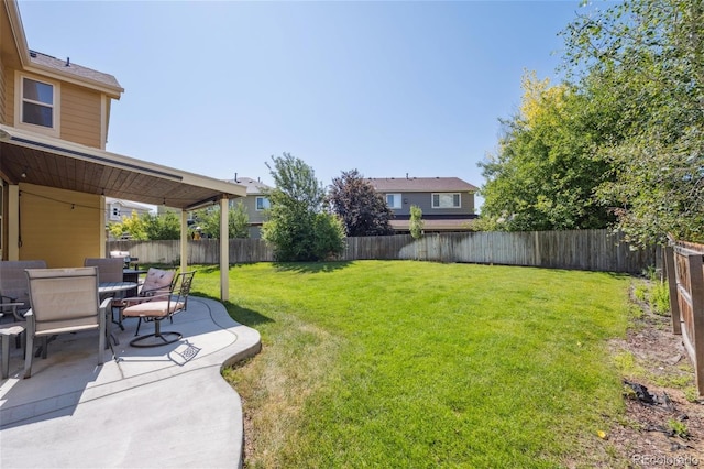 6260 E 114th Ave, Thornton, CO 80233 - fenced backyard featuring a patio and outdoor dining area