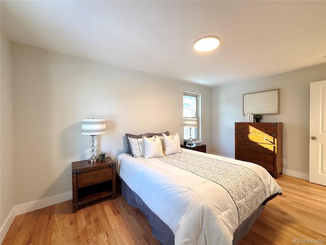 bedroom featuring light wood-type flooring