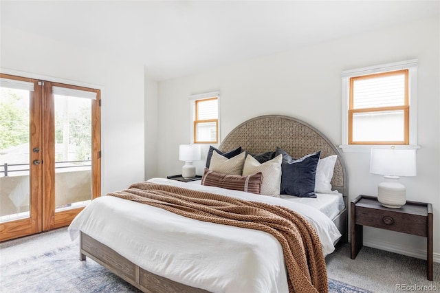 1272 S Milwaukee St, Denver, CO 80210 - bedroom with access to exterior and light colored carpet