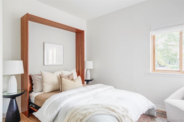 1272 S Milwaukee St, Denver, CO 80210 - bedroom featuring light wood-type flooring