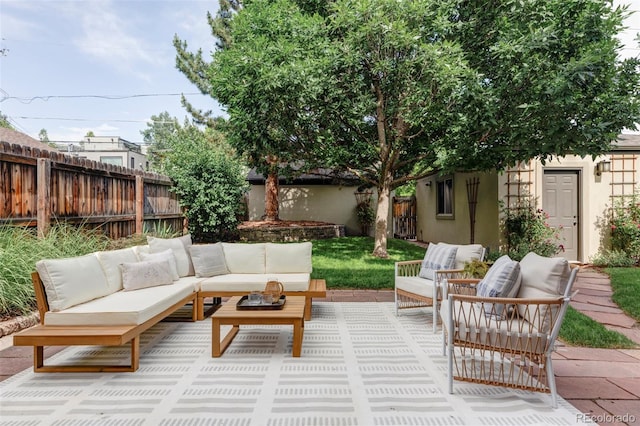 1272 S Milwaukee St, Denver, CO 80210 - fenced backyard featuring outdoor lounge area