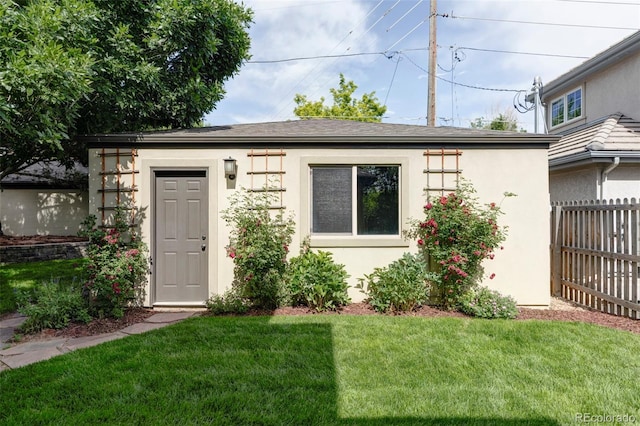 1272 S Milwaukee St, Denver, CO 80210 - view of front of home with stucco siding, an outdoor structure, and a shingled roof
