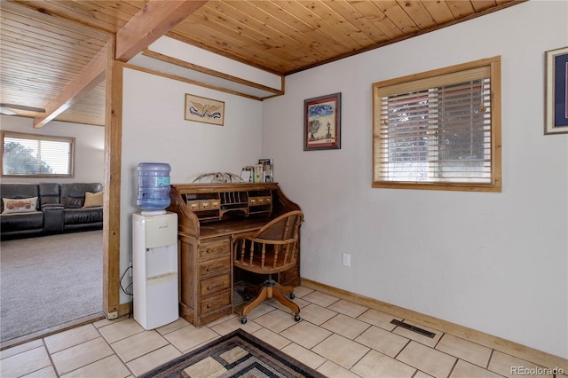 952 Burland Dr, Bailey, CO 80421 - office area featuring wooden ceiling with exposed beams, light tile patterned floors, baseboards, and light colored carpet