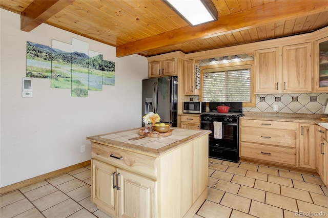 952 Burland Dr, Bailey, CO 80421 - kitchen featuring refrigerator with ice dispenser, black gas range, tile counters, light brown cabinetry, and stainless steel microwave
