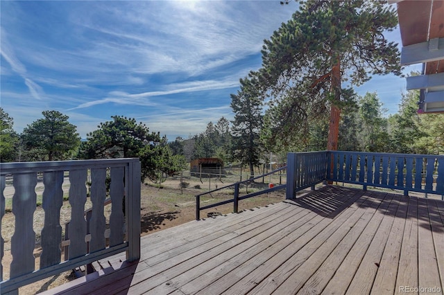 952 Burland Dr, Bailey, CO 80421 - wooden terrace featuring view of wooded area