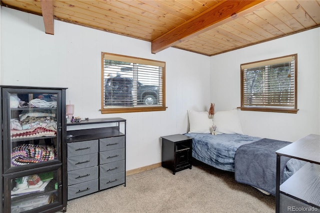 952 Burland Dr, Bailey, CO 80421 - bedroom with carpet flooring, wooden ceiling with exposed beams, and baseboards