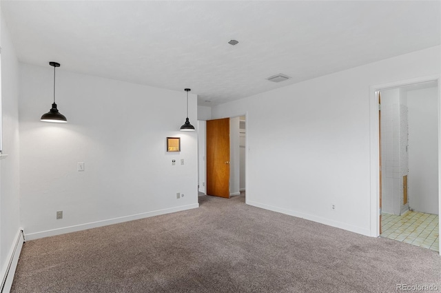 4731 W 66th Ave, Arvada, CO 80003 - carpeted spare room with a baseboard heating unit and baseboards