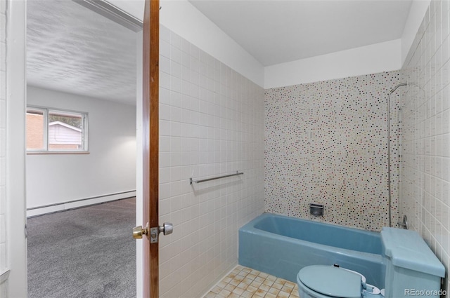 4731 W 66th Ave, Arvada, CO 80003 - full bathroom featuring a baseboard heating unit, tile walls, and toilet