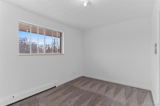 4731 W 66th Ave, Arvada, CO 80003 - unfurnished room with baseboard heating, carpet floors, and baseboards